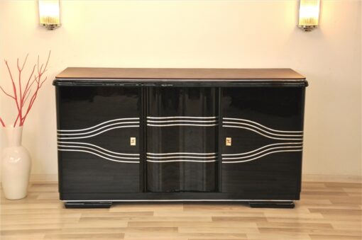 Art Deco Sideboard, wonderful straight body with rounded corners, highgloss black, big chromebars, hand polished, leatherplate, plenty of storage space