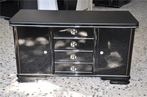 Art Deco Commode, wonderful straight body, curved foot, highloss black , small chromefittings, handpolished, 4 massive drawers, leatherplate