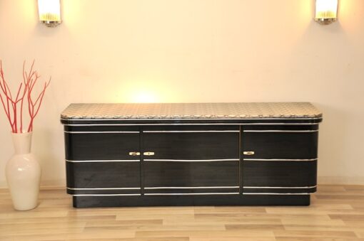 Art Deco Sideboard, chromebands, leather covered plate ( snake-optics ), chromefittings, handpolished, highgloss