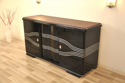 Art Deco Sideboard, wonderful straight body with rounded corners, highgloss black, big chromebars, hand polished, leatherplate, plenty of storage space