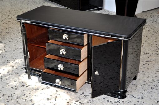 Art Deco Commode, wonderful straight body, curved foot, highloss black , small chromefittings, handpolished, 4 massive drawers, leatherplate