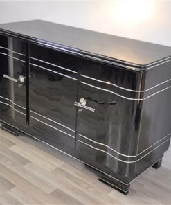 Art Deco Chromliner Sideboard, massive chromehandles, handpolished pianolacquer, timeless Design with curved doors