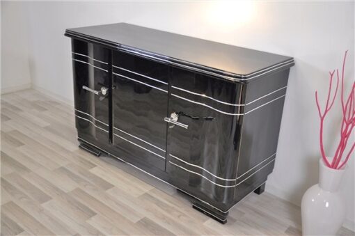 Art Deco Chromliner Sideboard, massive chromehandles, handpolished pianolacquer, timeless Design with curved doors