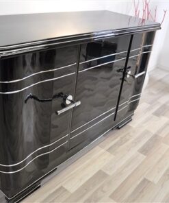 Art Deco Chromliner Sideboard, massive chromehandles, handpolished pianolacquer, timeless Design with curved doors