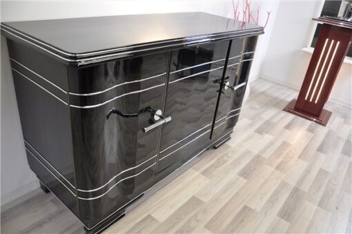 Art Deco Chromliner Sideboard, massive chromehandles, handpolished pianolacquer, timeless Design with curved doors