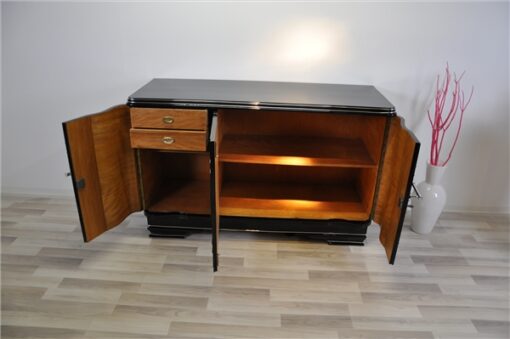 Art Deco Chromliner Sideboard, massive chromehandles, handpolished pianolacquer, timeless Design with curved doors