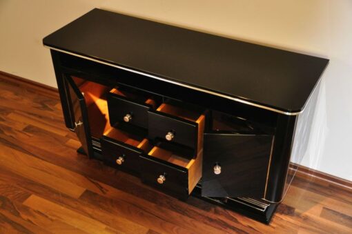 Art Deco Commode, straight body language, chromeliner, 4 drawers and 2 doors, black pianolacquer, handpolished