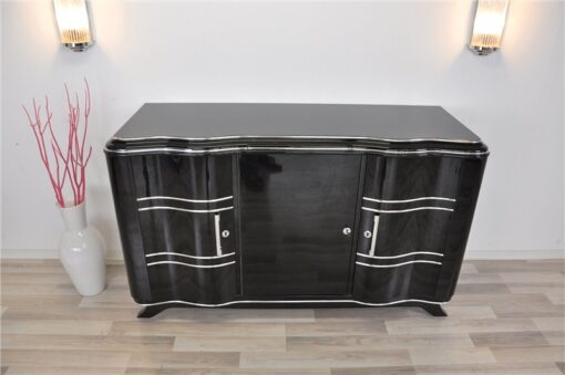 Elegant Art Deco Sideboard, elegant design with curved doors, chromelines and chrome fittings, pianolacquer in highgloss black, handpolished