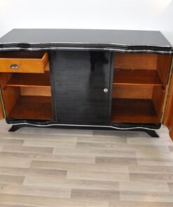 Elegant Art Deco Sideboard, elegant design with curved doors, chromelines and chrome fittings, pianolacquer in highgloss black, handpolished