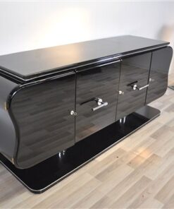 absolute unique furniture - france 1932, curved form - timeless design, big feet with chromed legs,black highgloss paintjob, plenty of storage space