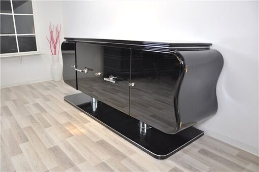 absolute unique furniture - france 1932, curved form - timeless design, big feet with chromed legs,black highgloss paintjob, plenty of storage space