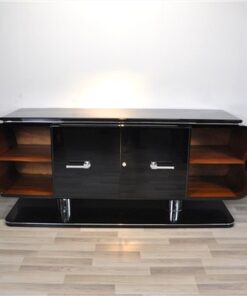 absolute unique furniture - france 1932, curved form - timeless design, big feet with chromed legs,black highgloss paintjob, plenty of storage space