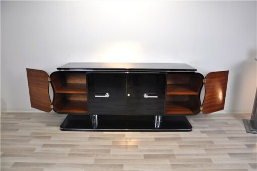 absolute unique furniture - france 1932, curved form - timeless design, big feet with chromed legs,black highgloss paintjob, plenty of storage space