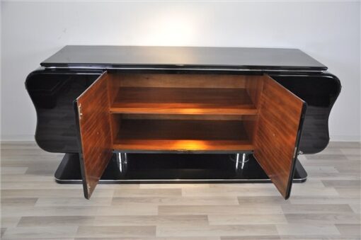 absolute unique furniture - france 1932, curved form - timeless design, big feet with chromed legs,black highgloss paintjob, plenty of storage space