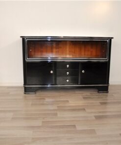 Art Deco Sideboard,black pianolacquer and chrome applications, 2 glas sliding doors infront of a big vitrine compartement, 3 drawers and 2 doors