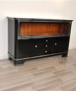 Art Deco Sideboard,black pianolacquer and chrome applications, 2 glas sliding doors infront of a big vitrine compartement, 3 drawers and 2 doors