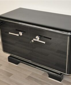 Art Deco Commode, elegant Design with rounded corners, chromelines, big chromehandles, pianolacquer