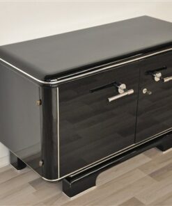 Art Deco Commode, elegant Design with rounded corners, chromelines, big chromehandles, pianolacquer