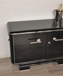 Art Deco Commode, elegant Design with rounded corners, chromelines, big chromehandles, pianolacquer