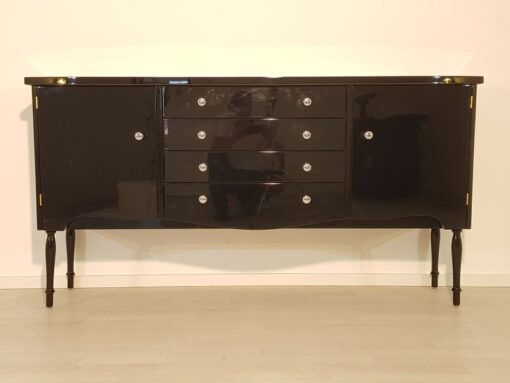 Art Deco Commode, curved body, highgloss black pianolacquer, chrome handles, wonderful feet