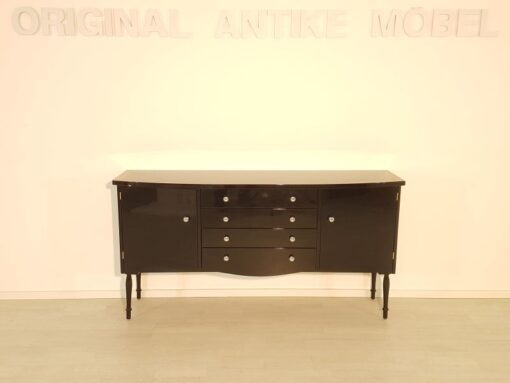 Art Deco Commode, curved body, highgloss black pianolacquer, chrome handles, wonderful feet