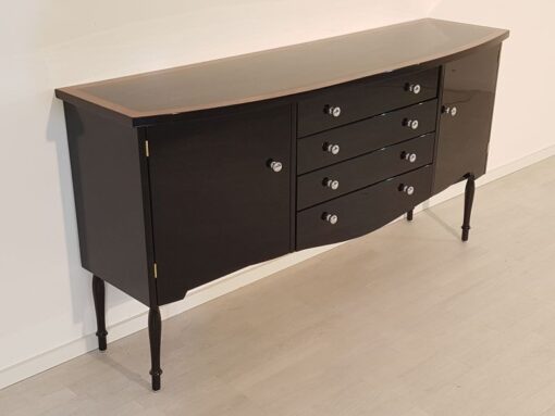 Art Deco Commode, curved body, highgloss black pianolacquer, chrome handles, wonderful feet