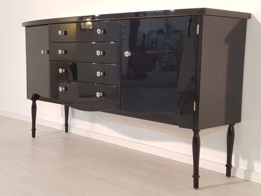 Art Deco Commode, curved body, highgloss black pianolacquer, chrome handles, wonderful feet