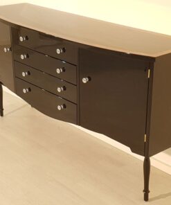 Art Deco Commode, curved body, highgloss black pianolacquer, chrome handles, wonderful feet