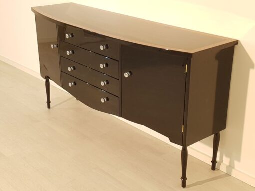 Art Deco Commode, curved body, highgloss black pianolacquer, chrome handles, wonderful feet