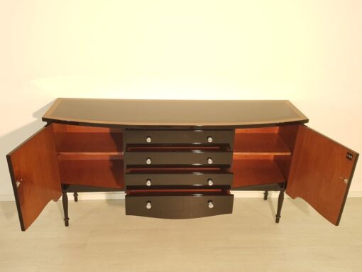 Art Deco Commode, curved body, highgloss black pianolacquer, chrome handles, wonderful feet