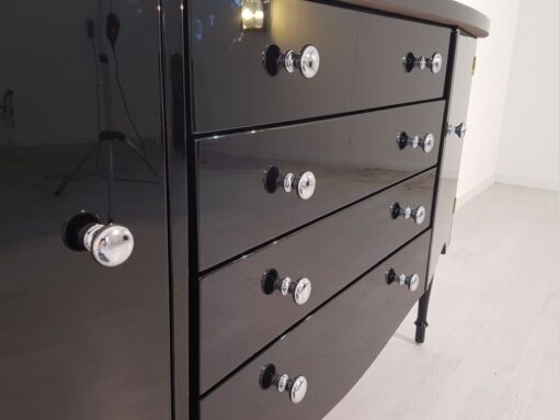 Art Deco Commode, curved body, highgloss black pianolacquer, chrome handles, wonderful feet