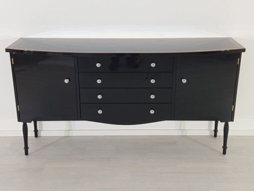 Art Deco Commode, curved body, highgloss black pianolacquer, chrome handles, wonderful feet