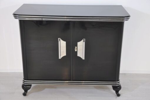 Art Deco Commode, highglossblack pianolacquer,fine chrome details and big chrome handles, clean interior, 1925