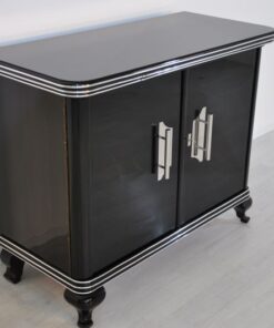 Art Deco Commode, highglossblack pianolacquer,fine chrome details and big chrome handles, clean interior, 1925