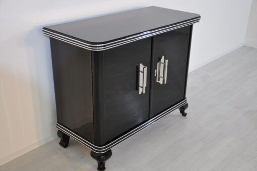 Art Deco Commode, highglossblack pianolacquer,fine chrome details and big chrome handles, clean interior, 1925