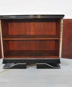 Art Deco Commode, straight forward body language, big chrome applications, wonderful foot, pianolacquer in highglossblack, interior made of cherrywood