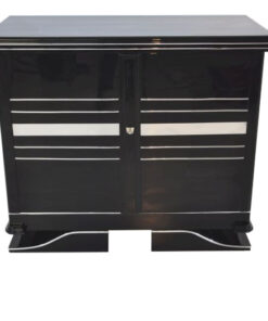 Art Deco Commode, straight forward body language, big chrome applications, wonderful foot, pianolacquer in highglossblack, interior made of cherrywood