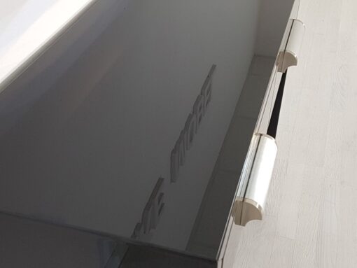 small bauhaus console, unique and simple design, highgloss black piano lacquer, big chromehandles