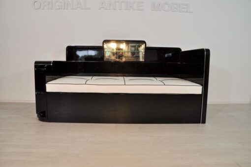 Art Deco Daybed, highgloss black pianolacquer, wonderful form, mirror compartment, hughest quality, commode at the head ende, mahogany