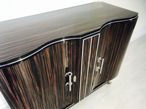 Art Deco, commode, design, beautiful foot, macassar, wood, high gloss finsih, hand polished, straight form, serpentine doors, chromed handles,